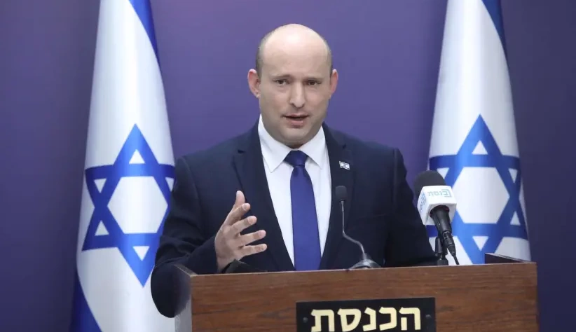 O primeiro-ministro Naftali Bennett é visto falando no Knesset, em 5 de julho de 2021. (crédito da foto: Marc Israel Sellem | The Jerusalem Post)